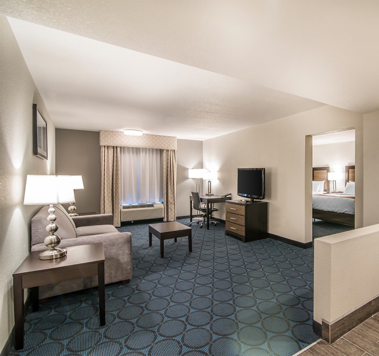 a room with a television and a bed