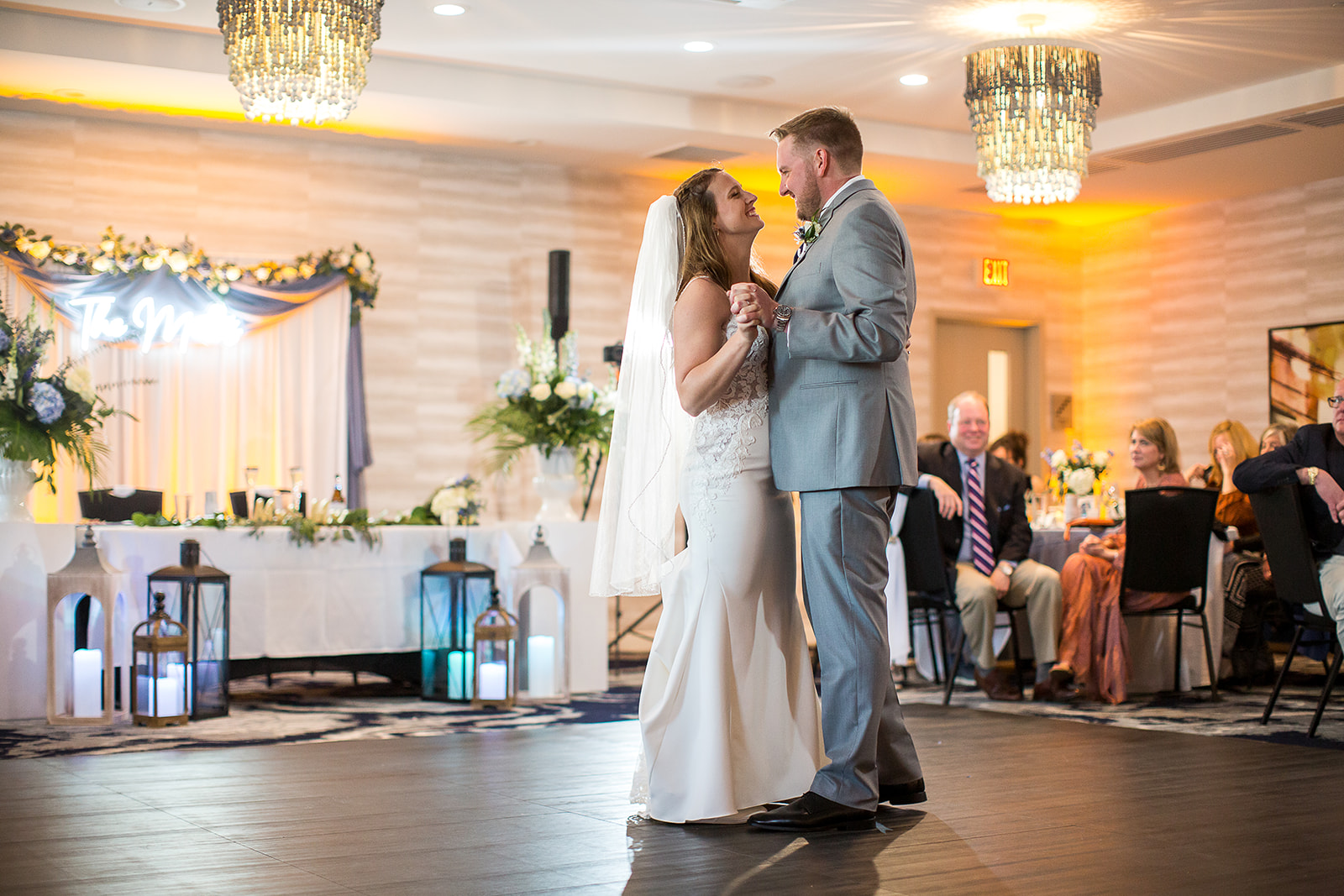 a man and woman dancing in a room