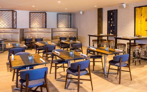 dining area with tables for two people