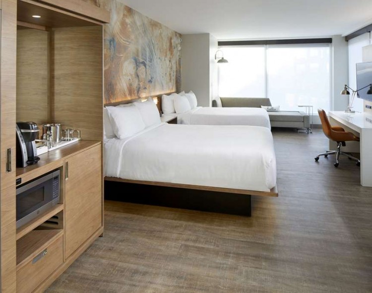 Spacious room with 2 queen beds and coffee maker