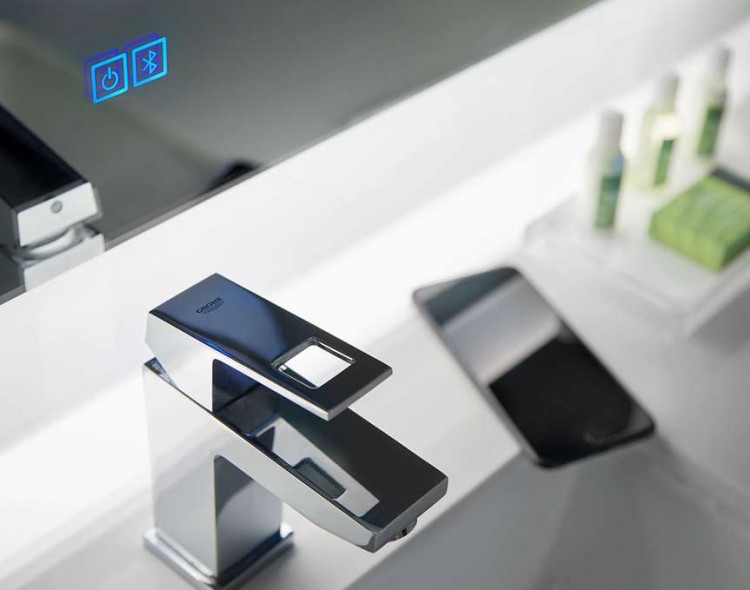closeup of bathroom sink and bluetooth vanity mirror