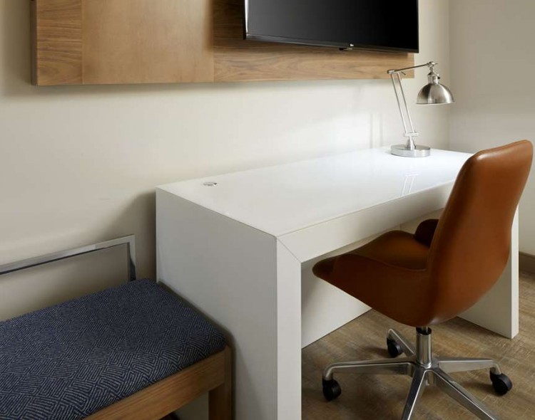 desk and chair in guest room