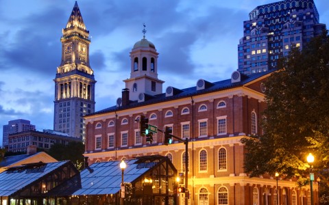 a building with a tower and a street light
