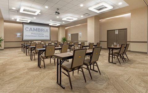 a room with tables and chairs