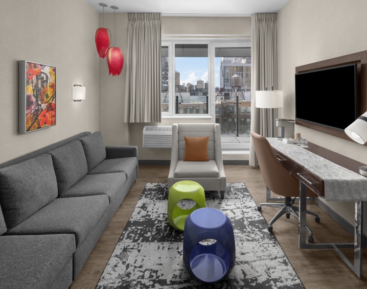 a living room with a couch and a television