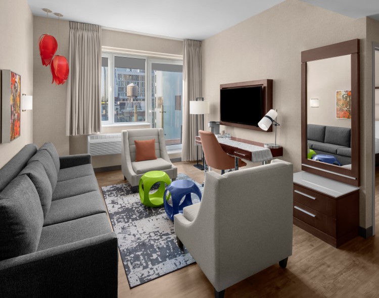 a room with a couch and a television