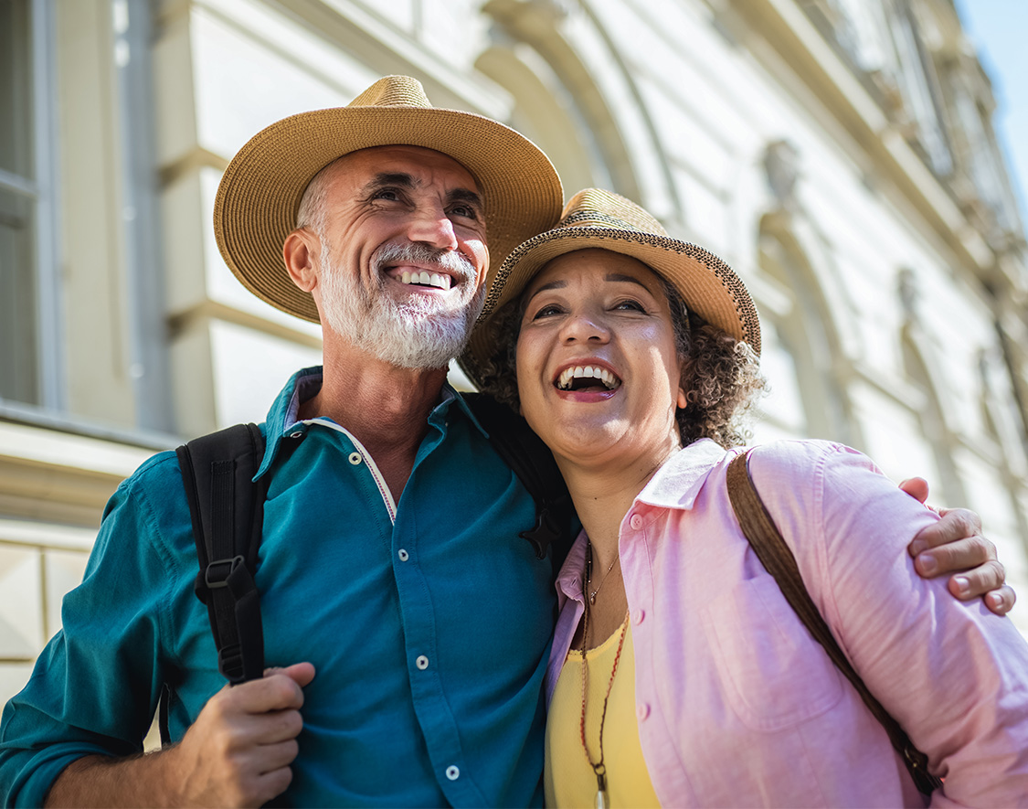 a man and woman smiling