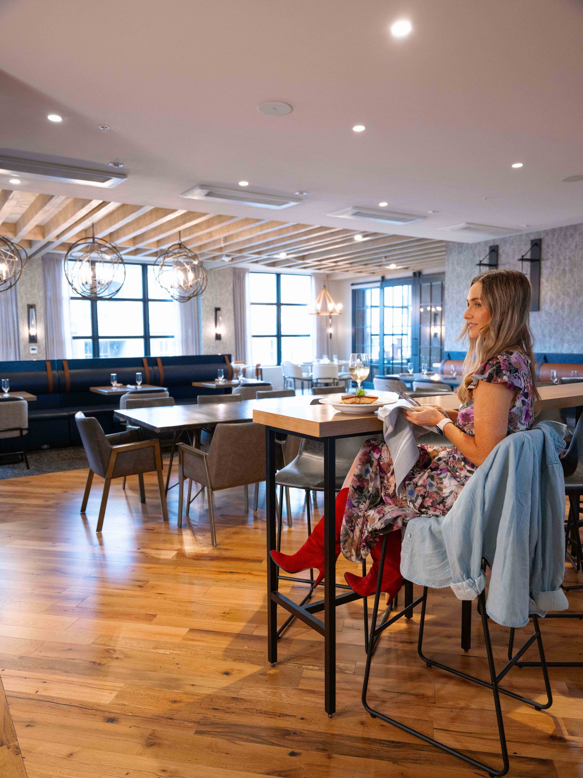 a woman sitting at a table