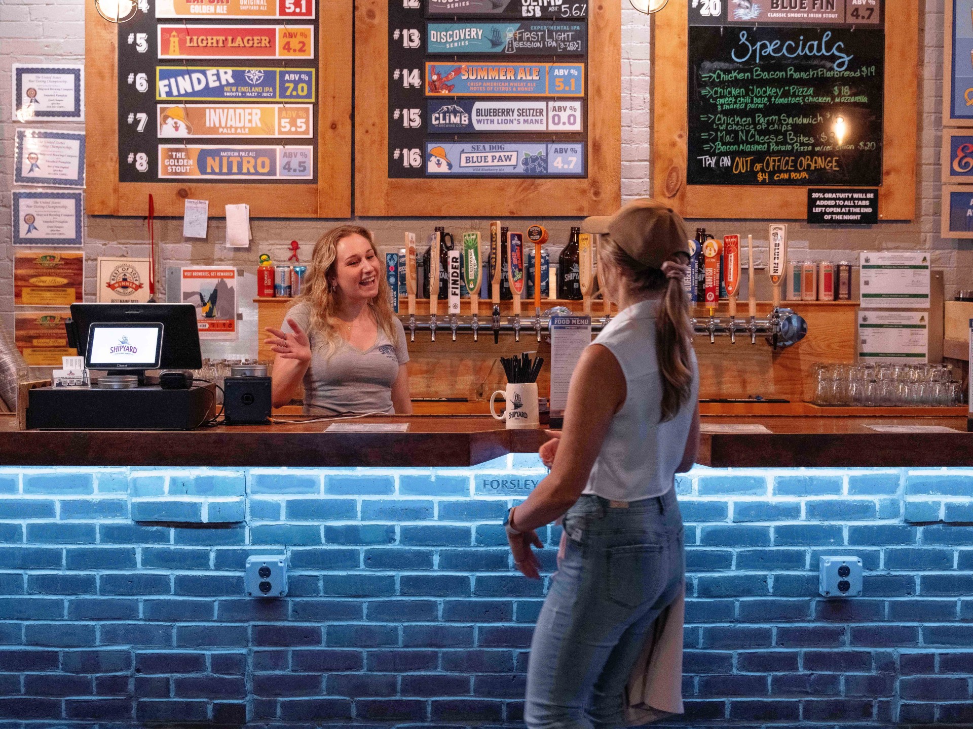 a woman standing at a counter