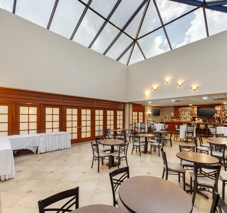 a room with tables and chairs