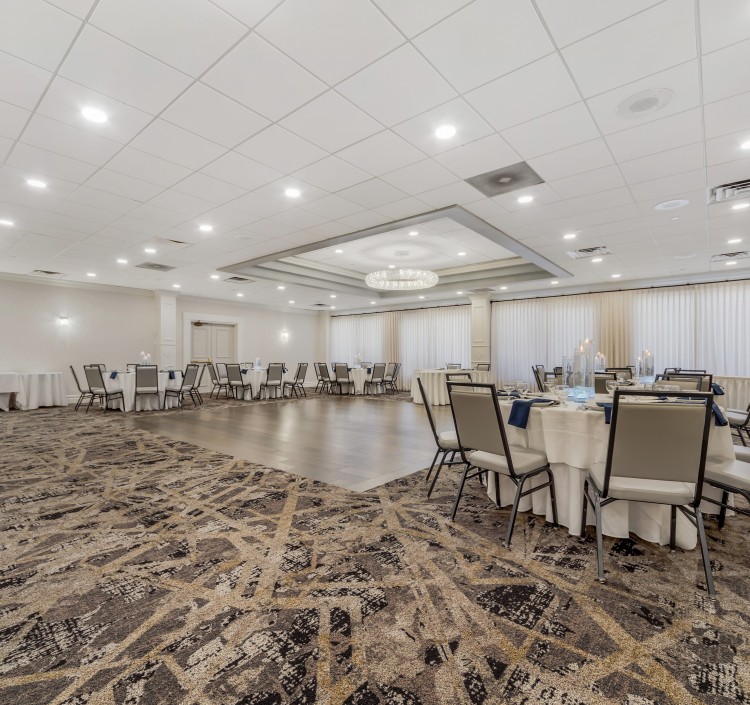a room with tables and chairs