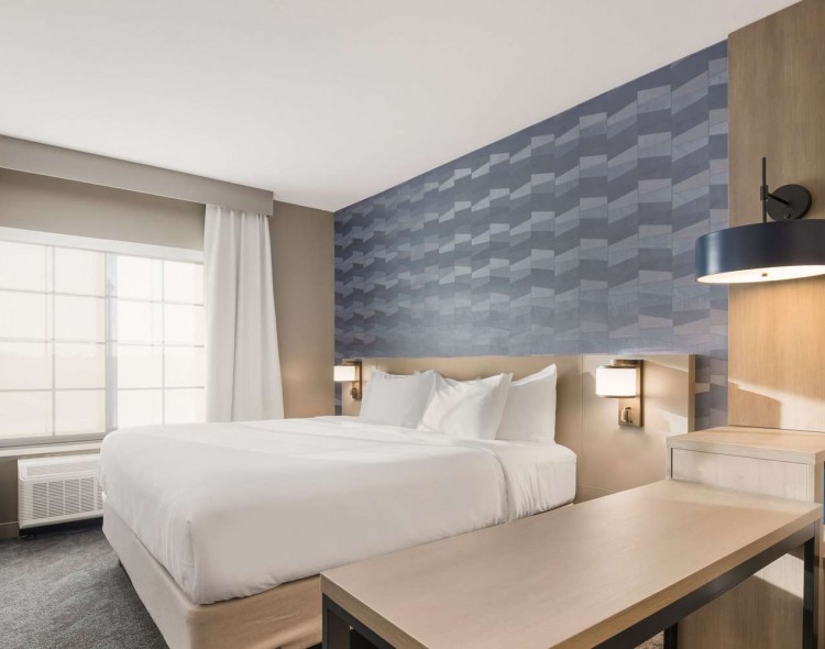 King bed with counter space next to bed