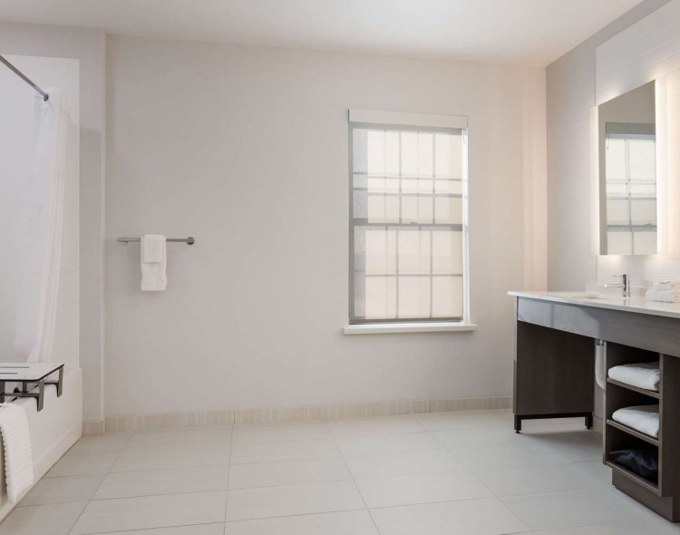 Bathroom with large space and accessible tub