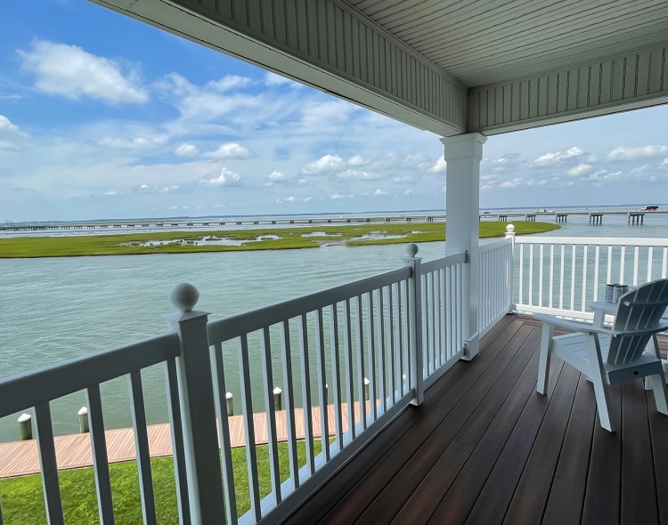balcony of a property with a lake view