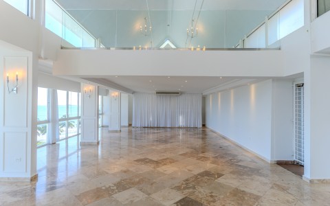 a large room with a large window and a large wall