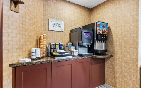 a coffee machine and coffee maker on a counter