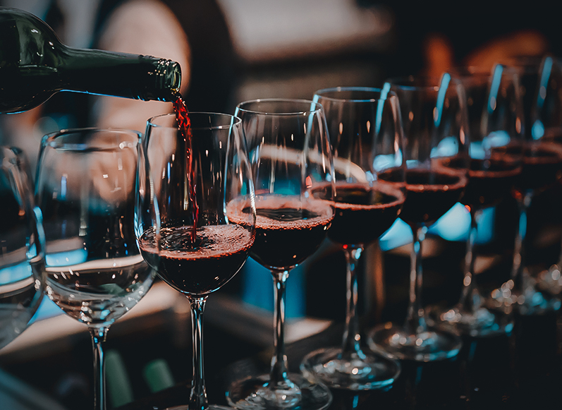a group of wine glasses on a table