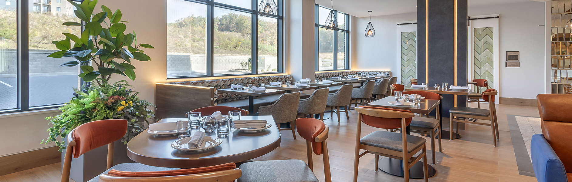 a restaurant with tables and chairs