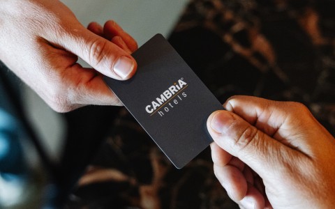 a person holding a card