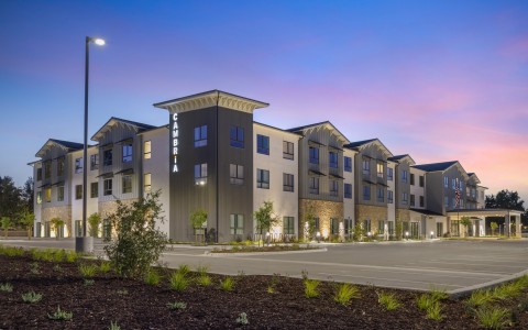 a building with a parking lot