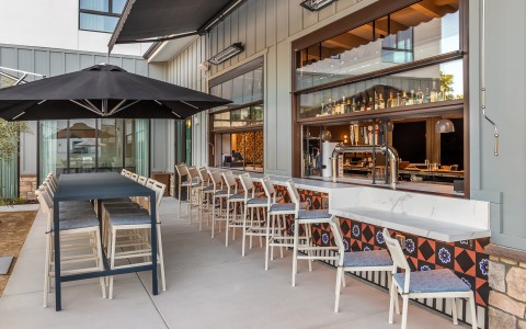 a restaurant with tables and chairs