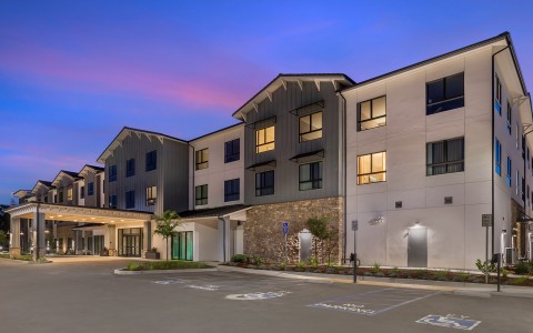 a building with a parking lot