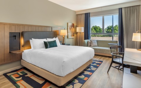 a room with a bed and a chair