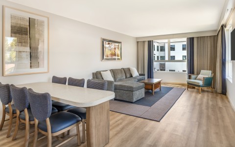 a living room with a couch and a table