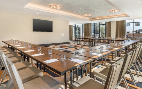 a room with tables and chairs