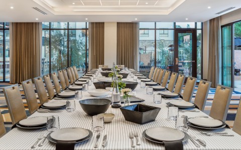 a large table set for a dinner party