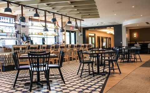 a room with tables and chairs