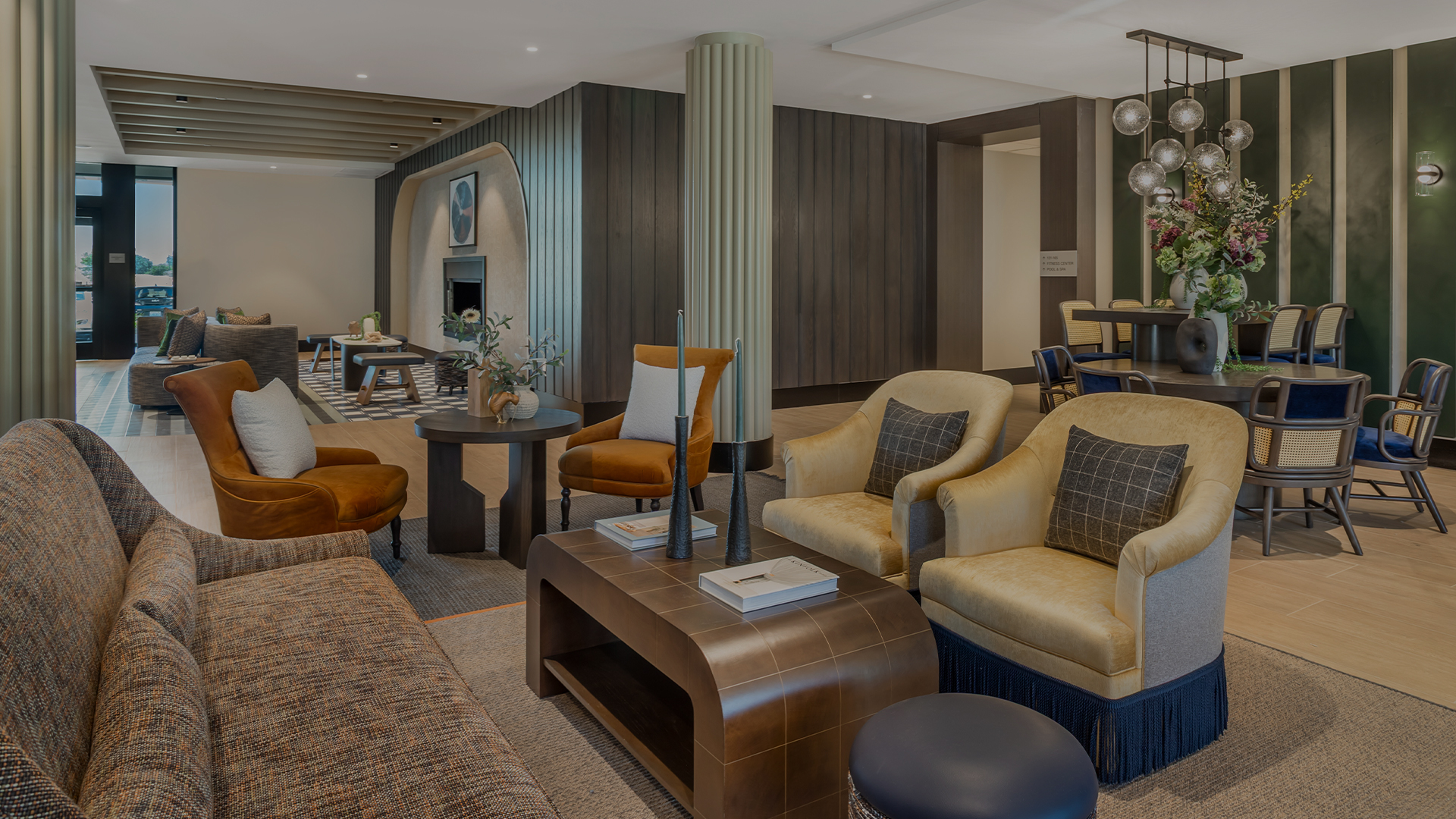 a room with a large table and chairs