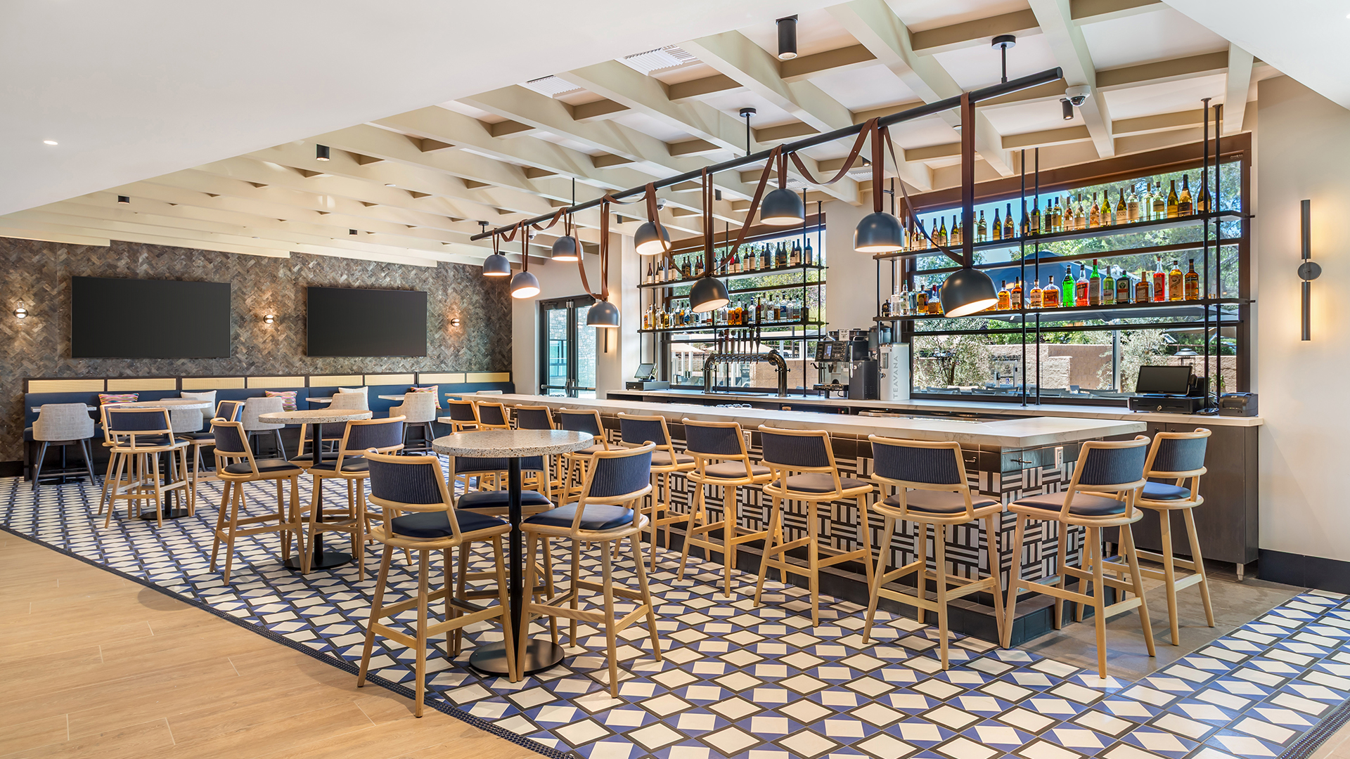 a bar with tables and chairs
