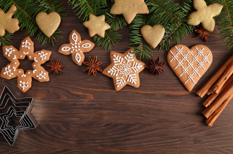 a group of cookies and pine branches