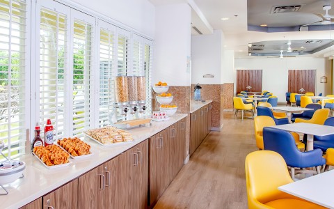 a room with a buffet of food