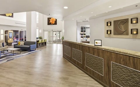 a reception desk in a hotel lobby