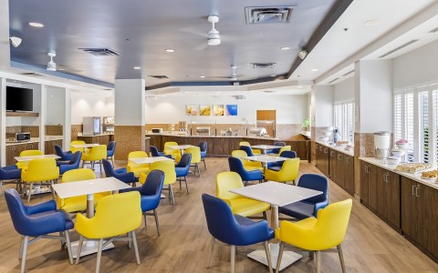 a room with tables and chairs