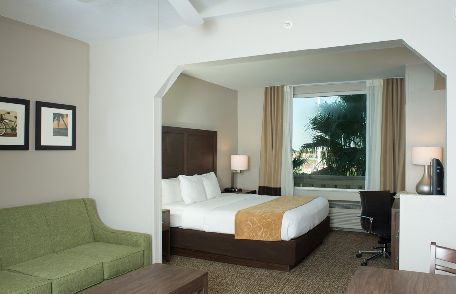 king bed in suite with living room