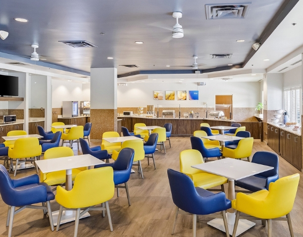 a room with tables and chairs