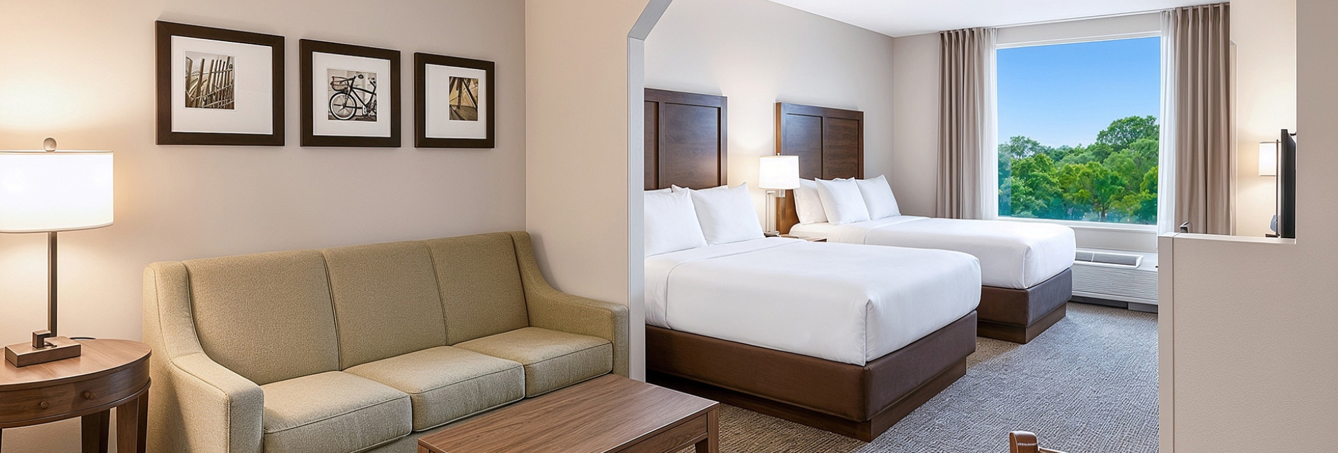 a hotel room with two beds