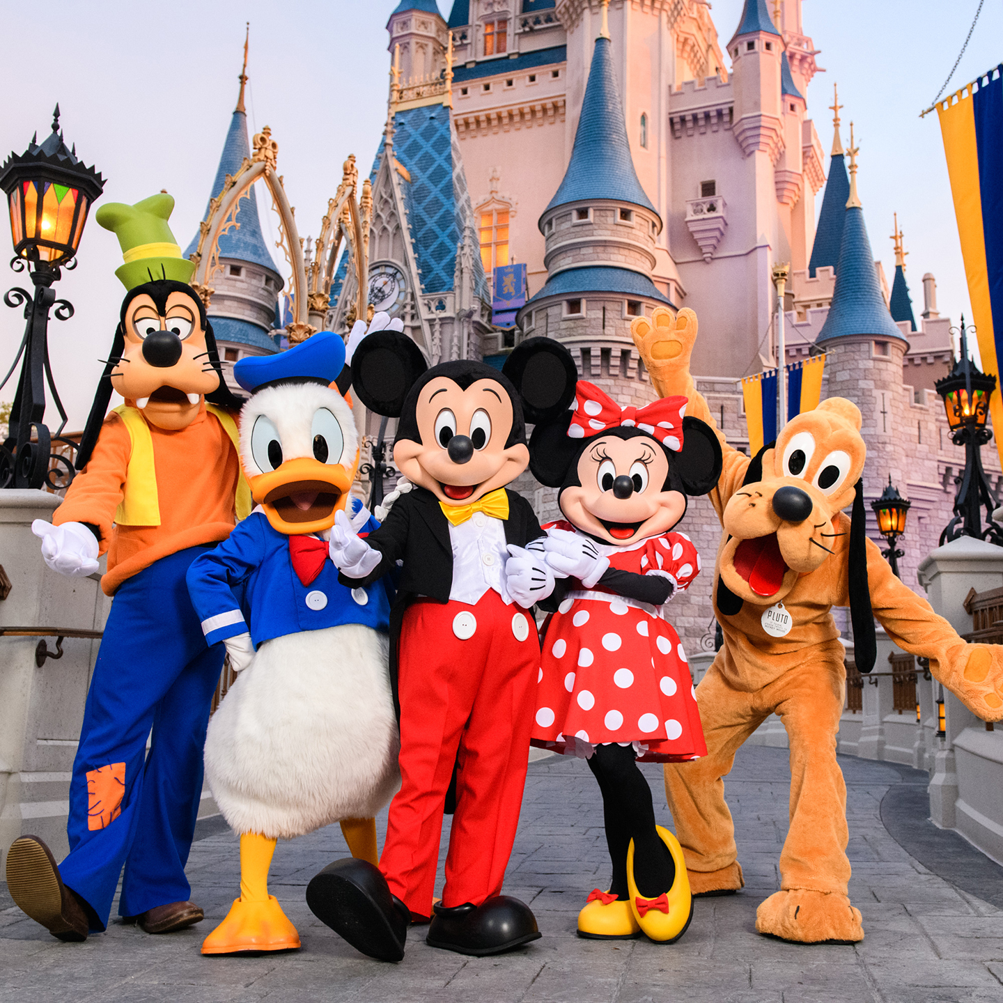 a group of people in clothing posing for a photo