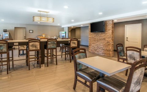 a room with a table and chairs