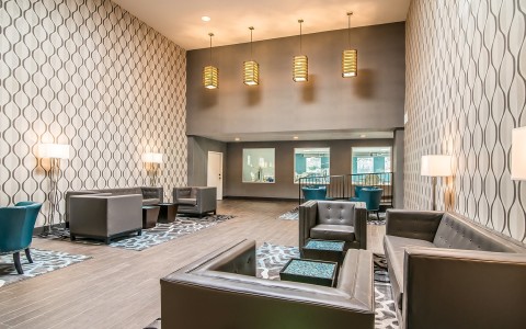 a room with couches and chairs