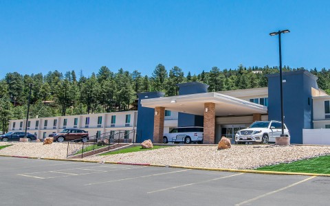 a building with cars parked in front of it