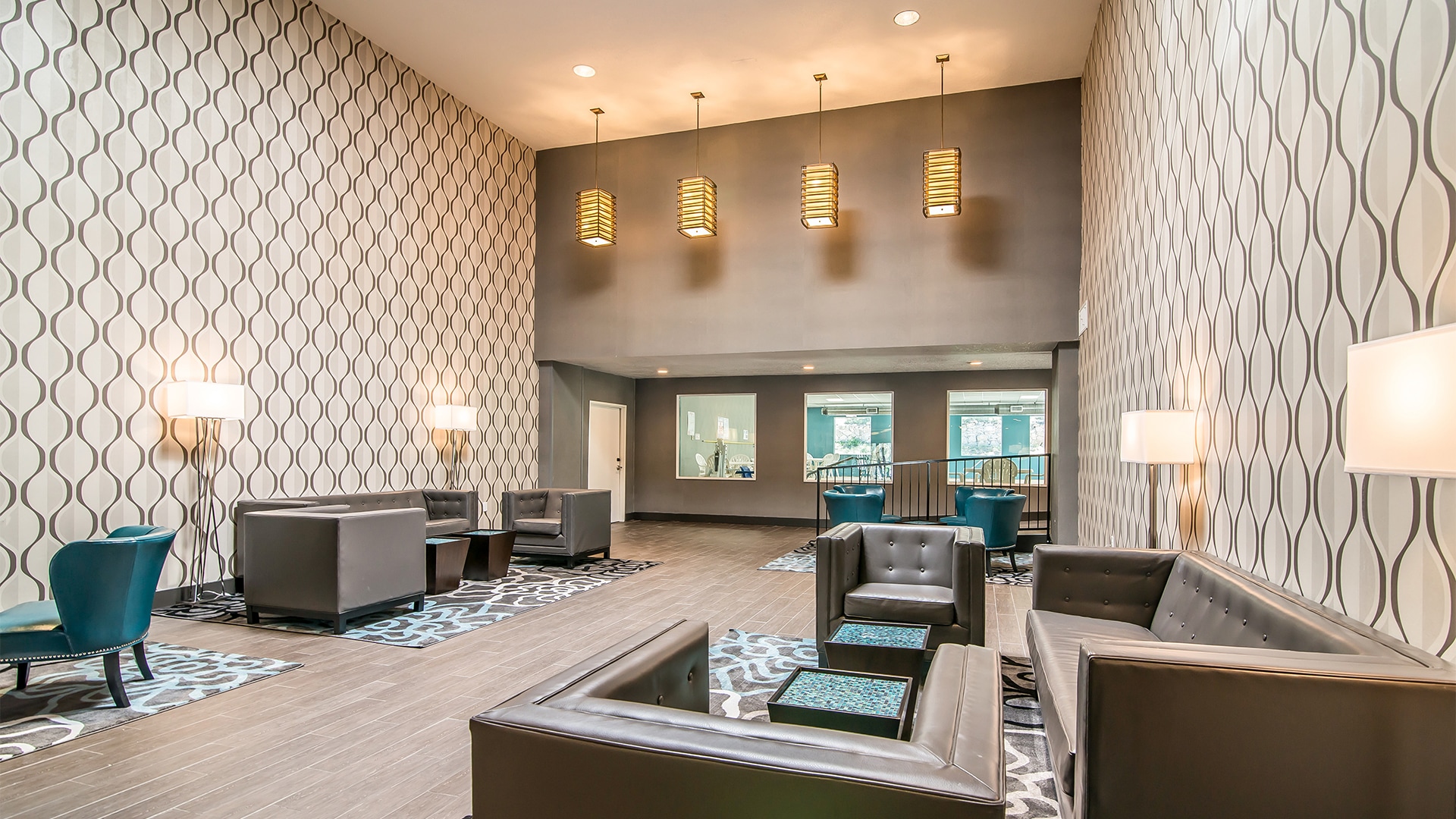 a room with couches and chairs