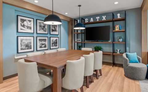 a room with a table and chairs