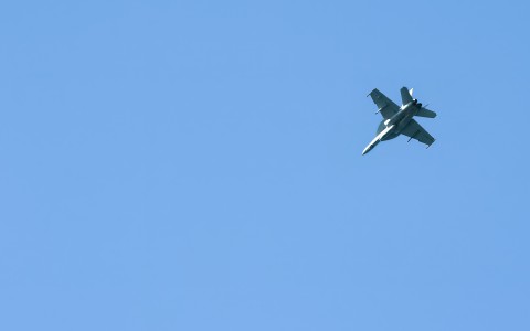 a jet plane flying in the sky